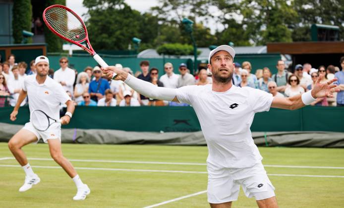 Dutch Sem Verbeek and Belgian Sander Gille pictured during a doubles tennis match between Argentinian-Spain pair Zeballos - Granollers and Belgian-Dutch pair Gille-Verbeek, in the second round of the Men s doubles at the Wimbledon grand slam tennis tournament in London, Britain, Saturday 04 July 2026. BENOITxDOPPAGNE  x180331517x