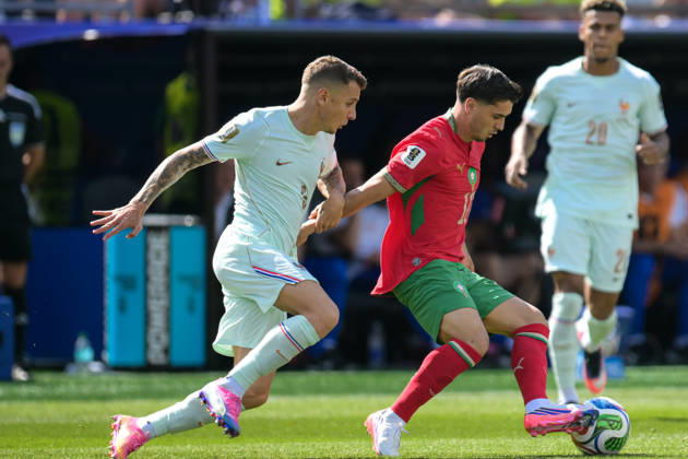 Soccer, 2026 World Cup, 20260709, France vs. Morocco. Pictured from left: Lucas DIGNE (France, 3) and Brahim DÃ u008DAZ (Morocco, 10) in a tackle for the ball at Foxborough Stadium in Boston, Massachusetts, United States of America Copyright: Passion2Press MarkusxFischerx