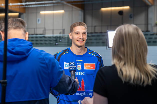 July 20, 2026, xgox, Opel HBL SC Magdeburg Handball Photo Op for the 2026–27 Season, emspor, from left: Dominik Kuzmanovic, Magdeburg, 1 being interviewed, Magdeburg