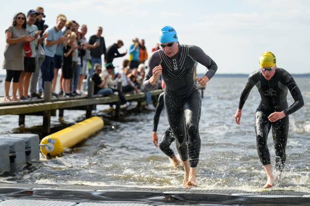 DTU German Mixed Relay Championships as part of Die Finals Hannover: Laura Lindemann of Triathlon Potsdam transitions from swimming to cycling at the DTU German Mixed Relay Championships as part of Die Finals Hannover, July 23, 2026. COPYRIGHT Petko Beier petkobeier.de, Steinhuder Meer, Germany