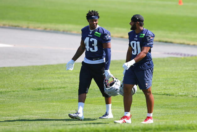 July 26, 2026; Foxborough, MA, USA; New England Patriots linebacker Bradyn Swinson (43) and New England Patriots linebacker Elijah Ponder (91) walk to the practice field during Patriots training camp at Gillette Stadium. CSM NFL, American Football Herren, USA 2026: Patriots Training Camp JUL 26 - ZUMAc04_ 20260726_zma_c04_150 Copyright: xAnthonyxNesmithx