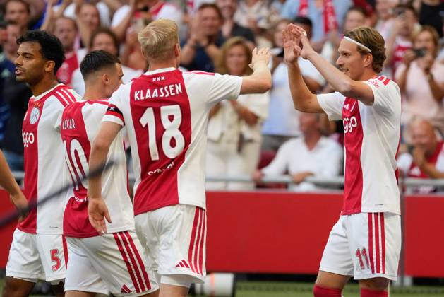 AMSTERDAM , 06-08-2026, Johan Cruijff ArenA , season 2026 2027 , UEFA Conference League play-off football . Match between Ajax and Shelbourne FC , Picture shows Ajax player Davy Klaassen, Ajax player Mika Godts celebrating the 1-0 Ajax - Shelbourne x205489024x Copyright: