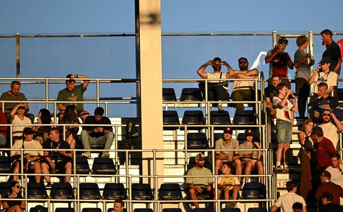 Paris Saint-Germain v Aston Villa - UEFA Super Cup SALZBURG, AUSTRIA - AUGUST 12: Fans are seen at tribune as some wearing protective solar viewing glasses to observe the partial solar eclipse ahead of the UEFA Super Cup match between Paris Saint-Germain and Aston Villa in Salzburg, Austria, on August 12, 2026. Harun Ozalp Anadolu Salzburg Austria. Editorial use only. Please get in touch for any other usage. Copyright: x2026xAnadoluxHarunxOzalpx