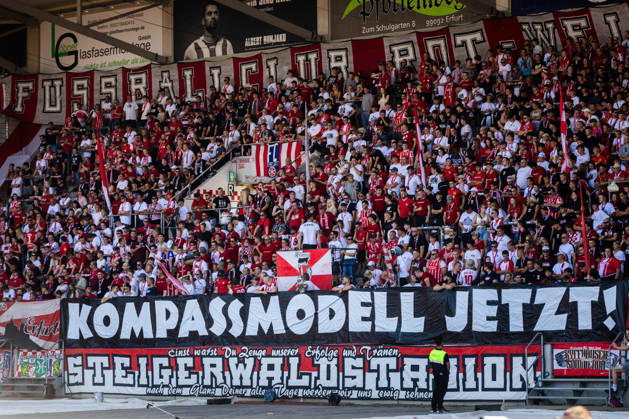 Erfurt, 150826, Northeast Regional Soccer League: FC Rot Weiss Erfurt vs. 1 FC Magdeburg U23. Pictured: Erfurt fans holding a banner calling for promotion reform, the Kompass model. Now