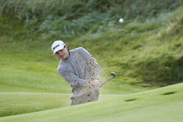 BALMEDIE, SCOTLAND - AUG 21: Maximilian Steinlechner (AUT) plays from a green side bunker on the 1st hole during Round 2 at the 2026 Nexo Championship at the Trump International Golf Links, Balmedie on August 21, 2026 in Aberdeenshire, Scotland The 2026 Nexo Championship