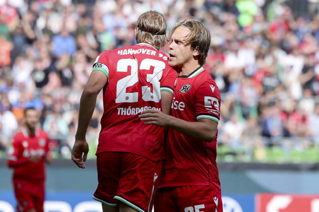 Stefan Teitur Thordarson of Hannover 96 celebrates his goal—making the score 0–1—with Lars Gindorf of Hannover 96 during the DFB Cup match between SV Hemelingen and Hannover 96 at Weserstadion on August 22, 2026, in Bremen, Germany. Photo by Marco Steinbrenner, DeFodi Images. Stefan Teitur Thordarson of Hannover 96 celebrates after scoring his team’s first goal with Lars Gindorf of Hannover 96 during the DFB Cup match between SV Hemelingen and Hannover 96 at Weserstadion on August 22, 2026 in Bremen, Germany. Photo by Marco Steinbrenner, DeFodi Images. Photo by Marco Steinbrenner, DeFodi Images.