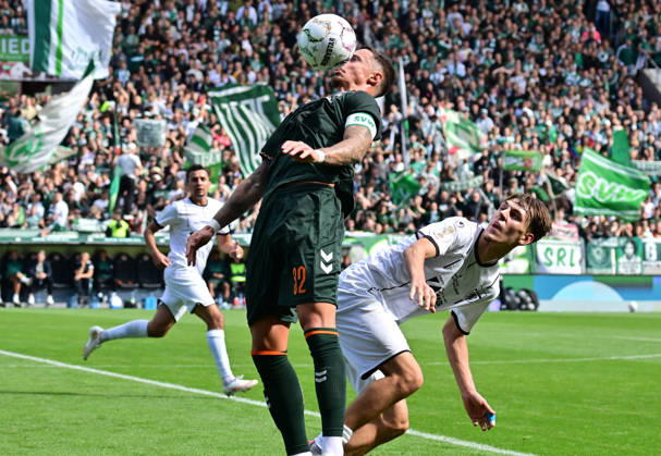 August 22, 2026, German Soccer, Men, DFB Cup, 1st Round, 2026–2027 Season, Hamburg, Lüneburger SK vs. Werder Bremen: Marco Friedl (Werder, 32) tries to get past Tjark Dörr (Lüneburg, 20). DFB and DFL regulations prohibit any use of photographs as image sequences and or quasi-video. Hamburg Millerntorstadion, Hamburg, Germany Copyright: xnordphotoxGmbH xWitkex