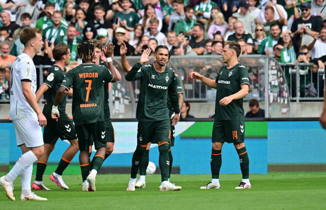 August 22, 2026, German Soccer, Men, DFB Cup, 1st Round, 2026–2027 Season, Hamburg, Lüneburger SK vs. Werder Bremen: Jens Stage of Werder 06 scores the 1–0 goal for Bremen past goalkeeper Tommy Henze of Pauli 01 and celebrates with the team. DFB and DFL regulations prohibit any use of photographs as image sequences and or quasi-video. Hamburg Millerntorstadion, Hamburg, Germany Copyright: xnordphotoxGmbH xWitkex