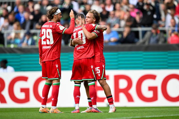 DFB Cup 26–27: SV Hemelingen vs. Hannover 96 on August 22, 2026, at the Weserstadion in Bremen—Cheers, goal celebrations, Goal scorers, goal scorer Lars Gindorf; Hannover celebrates after his goal to make it 0–7, with Marcel Hartel and Kolja Oudenne MT
