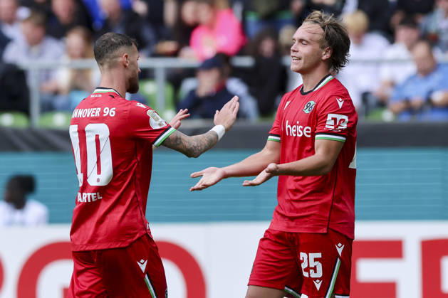 Lars Gindorf of Hannover 96 celebrates his goal—making the score 0–7—with Marcel Hartel of Hannover 96 during the DFB Cup match between SV Hemelingen and Hannover 96 at Weserstadion on August 22, 2026, in Bremen, Germany Photo by Marco Steinbrenner, DeFodi Images Lars Gindorf of Hannover 96 celebrates after scoring his team’s seventh goal with Marcel Hartel of Hannover 96 during the DFB Cup match between SV Hemelingen and Hannover 96 at Weserstadion on August 22, 2026, at the Weserstadion in Bremen, Germany. Photo by Marco Steinbrenner, DeFodi Images. Photo by Marco Steinbrenner, DeFodi Images.
