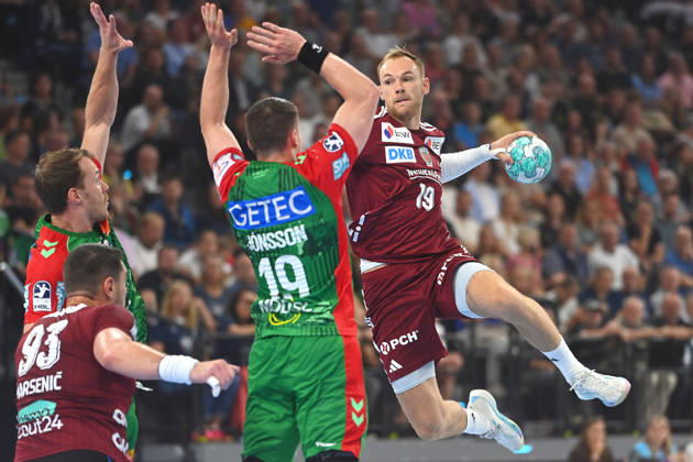 Mathias GIDSEL, Füchse Berlin, Shot on goal, action, one-on-one against Elvar Oern JONSSON, SC Magdeburg, Men s Rexel Super Cup 2026, SC Magdeburg vs. Fuechse Berlin on August 22, 2026, SAP GARDEN, Munich