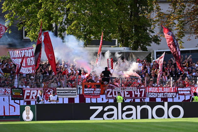 August 22, 2026, xjhx, Soccer, DFB Cup First Round, Eintracht Trier vs. RB Leipzig—Leipzig fans set off pyrotechnics, flares, smoke, fog, and fireworks in Trier