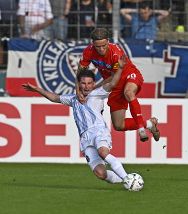 August 22, 2026, Soccer: 2026–27 DFB Cup, First Round, TSV 1860 Munich vs. Holstein Kiel, at the Grünwalderstrasse Stadium in Munich, Lance Fiedler (1860 Munich) vs. Jonas Therkelsen (Holstein Kiel)