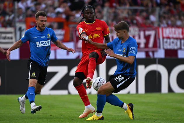 August 22, 2026, xjhx, Soccer, DFB Cup First Round, Eintracht Trier vs. RB Leipzig, Johan Bakayoko (RB Leipzig) vs. Matheo Kritzer (SV Eintracht Trier 05), tackle, action, battle for the ball, Trier