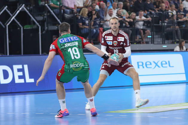 August 22, 2026, xgox, Handball, 2026 Rexel Super Cup, SC Magdeburg vs. Füchse Berlin, from left: Elvar Orn Jonsson (Magdeburg), 19 Mathias Gidsel (Berlin), 19 Munich