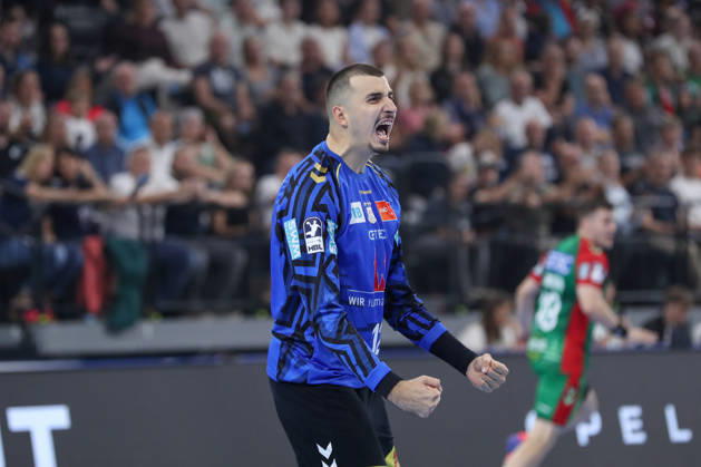 August 22, 2026, xgox, Handball, 2026 Rexel Supercup, SC Magdeburg vs. Füchse Berlin, from left: Matej Mandic (Magdeburg), 12 celebrating a saved shot, blocked, saved, Munich goalkeeper