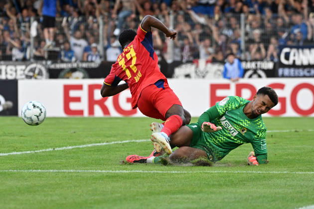 August 22, 2026, xjhx, Soccer DFB Cup First Round, Eintracht Trier vs. RB Leipzig, Ridle Baku, RB Leipzig, Leon Oumar, transfer to SV Eintracht Trier 05, tackle, action, battle for the ball, Trier