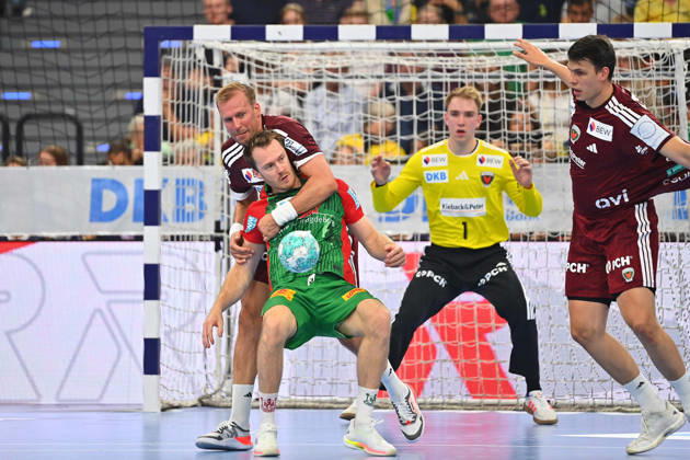 Max DAJ, Fuechse Berlin, Action,One-on-one against Felix CLAAR of SC Magdeburg; goalkeeper Lasse LUDWIG of Fuechse Berlin; Rexel Super Cup 2026 Men’s Handball: SC Magdeburg vs. Fuechse Berlin on August 22, 2026, at SAP GARDEN in Munich