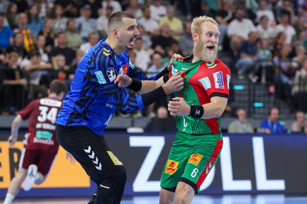 August 22, 2026, xgox, Handball Rexel Super Cup, SC Magdeburg vs. Füchse Berlin emspor, from left: Matej Mandic (Magdeburg), 12, Matthias Musche (Magdeburg), 6, cheering, goal celebration, celebrating the goal, Munich