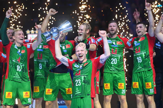 Award Ceremony: Magnus SAUGSTRUP, SC Magdeburg, with trophy, cup, player, team photo, team, squad, team photo, celebration,joy, excitement, handball Rexel Super Cup 2026 (men’s) SC Magdeburg vs. Füchse Berlin 38–30 on August 22, 2026, SAP GARDEN, Munich