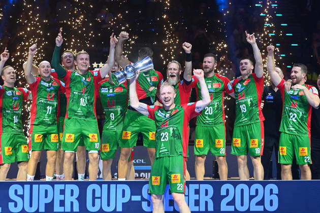 Award Ceremony: Magnus SAUGSTRUP, SC Magdeburg, with trophy, cup, player, team photo, team, squad, team photo, celebration,joy, excitement, handball Rexel Super Cup 2026 (men’s) SC Magdeburg vs. Füchse Berlin 38–30 on August 22, 2026, SAP GARDEN, Munich