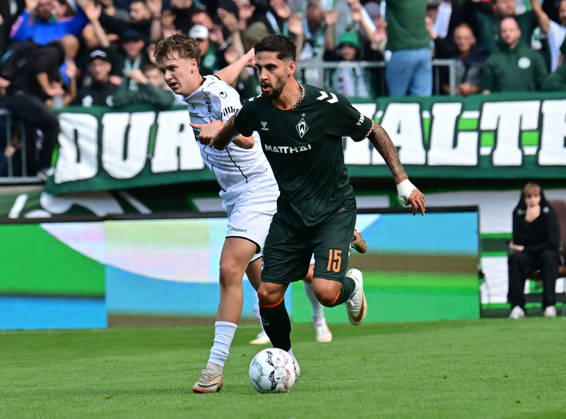 August 22, 2026, German Soccer, Men, DFB Cup, 1st Round, 2026–2027 Season, Hamburg, Lüneburger SK vs. Werder Bremen: Nevio Scheuer (Lüneburg, No. 18) tries to get past Ludovit Reis (Werder, No. 15). DFB and DFL regulations prohibit any use of photographs as image sequences and or quasi-video. Hamburg Millerntorstadion, Hamburg, Germany Copyright: xnordphotoxGmbH xWitkex
