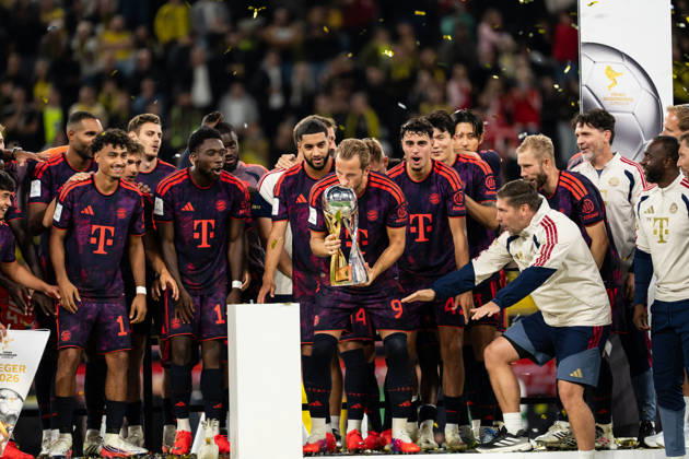 August 22, 2026, GER Germany, Soccer, 2026–2027 Season, Franz Beckenbauer Super Cup: Borussia Dortmund vs. FC Bayern Munich, Franz Beckenbauer Super Cup Winner 2026, FC Bayern Munich, Winners Photo, Harry Kane (FC Bayern Munich) kisses the trophy at Signal Iduna Park in Dortmund, North Rhine-Westphalia (NRW), Germany Copyright: xnordphotoxGmbHx xChristianxSchulzex