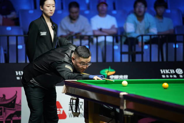 WUHAN, CHINA - AUGUST 23: Guan Zhen of China plays a shot in the first round match against Gao Yang of China on day 1 of Wuhan Open 2026 at the Optics Valley Gymnasium of Huazhong University of Science and Technology on August 23, 2026 in Wuhan, Hubei Province of China.  Copyright: xTaixChengzhex 111661617320