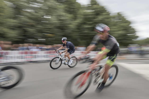 IRONMAN 70.3 Leipzig 2026 Cycling Segment, Sachsenbrücke: Athletes at the IRONMAN 70.3 Leipzig on August 23, 2026, during the cycling leg. The half-distance race consists of a 1.9-kilometer swim, a 90-kilometer bike ride, and a 21.1-kilometer run, and is part of the international IRONMAN 70.3 series