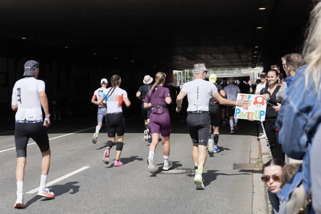 IRONMAN 70.3 Leipzig 2026 Running Segment: Athletes at the Sportforum during the IRONMAN 70.3 Leipzig on August 23, 2026, while running. The half-distance race consists of a 1.9-kilometer swim, a 90-kilometer bike ride, and a 21.1-kilometer run, and is part of the international IRONMAN 70.3 series