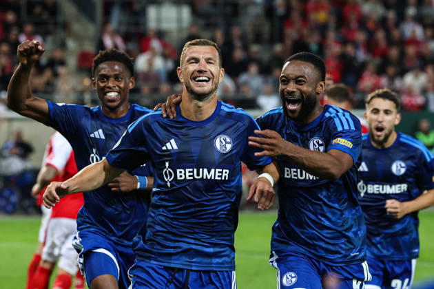 Goal celebration: Scorer Edin Dzeko of FC Schalke 04 scores on a penalty kick to make it 1–2 in the first round of the DFB Cup, 2026–2027 season, Hallescher FC Halle vs. FC Schalke 04 at the Leuna Chemie Stadium in Halle an der Saale. Action, soccer,man, men, Germany, August 24, 2026