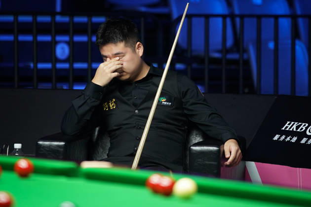 WUHAN, CHINA - AUGUST 25: Pang Junxu of China reacts in the third round match against Shaun Murphy of England on day 3 of Wuhan Open 2026 at the Optics Valley Gymnasium of Huazhong University of Science and Technology on August 25, 2026 in Wuhan, Hubei Province of China.  Copyright: xTaixChengzhex 111662030985