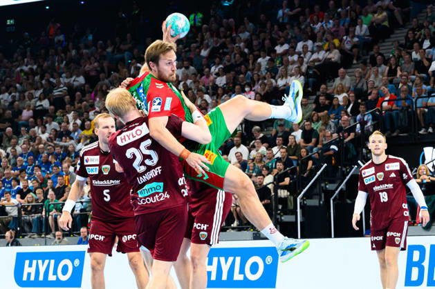 Munich HBL Super Cup 2026: SC Magdeburg vs. Fuechse Berlin—Matthes Langhoff (Berlin) and Albin Lagergren (SC Magdeburg) go head-to-head at the SAP Garden in Munich, Bavaria, Germany