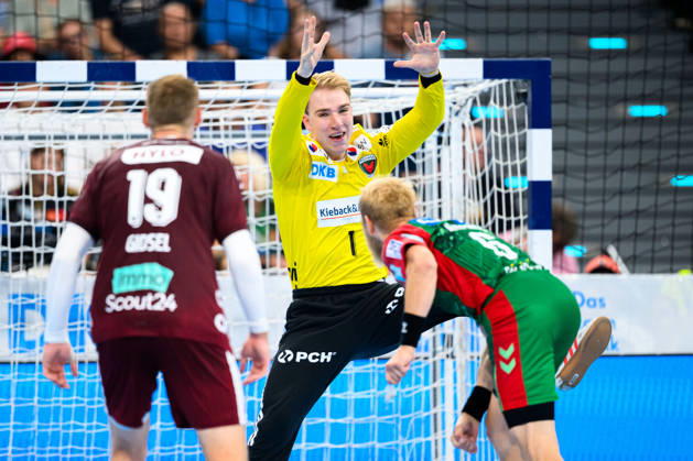 Munich HBL Super Cup 2026 SC Magdeburg, Fuechse Berlin; Goaltender Lasse Ludwig (Berlin), Matthias Musche (SC Magdeburg); Munich, SAP Garden, Bavaria, Germany