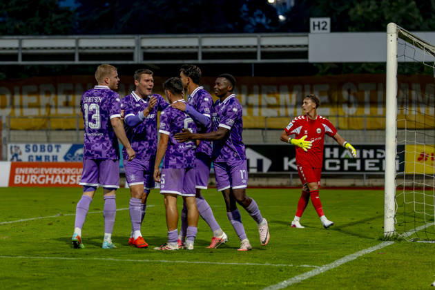 Burghausen, Germany, August 25, 2026, Toto Cup, 2026–2027 Bavarian State Cup, Round of 16: SV Wacker Burghausen vs. FC Ingolstadt 04. Pictured in the crowd: FCI goal scorer Emre Gül Guel celebrates his 0–2 goal with his teammates; Flatbuy Stadium, Bavaria Copyright: xFotostandx xSchäferx