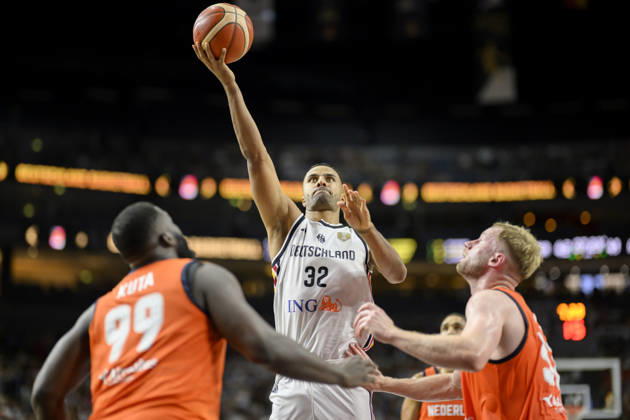 Johannes Thiemann, Germany in Action, shot, by Nathan Kuta, Netherlands Men s Basketball FIBA World Cup Qualifier, Second Round, Group K, Germany vs. Netherlands, on August 27, 2026, at the LanxessArena in Cologne, Germany