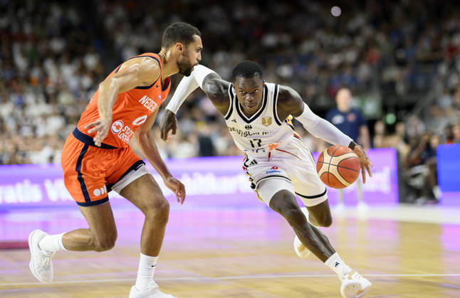 Dennis Schröder of Germany in action against Yannik Franke of the Netherlands; men s basketball FIBA World Cup qualifying game, Second Round Group K, Germany vs. the Netherlands, on August 27, 2026, at the LanxessArena in Cologne, Germany