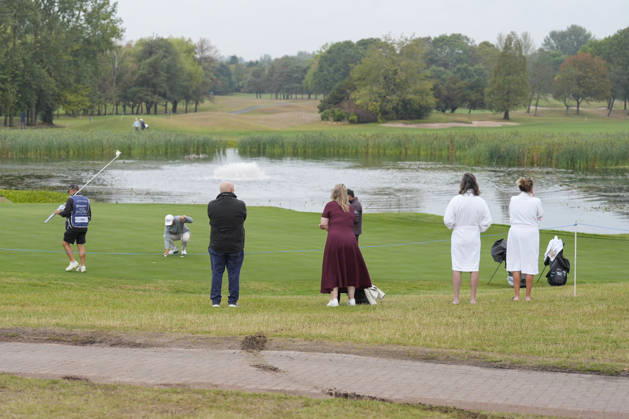 SUTTON COLDFIELD, ENGLAND - AUG 28: Spectators in their dressing gowns watch the early play during the completion of the delayed Round 1 at the 2026 Husqvarna British Masters at The Belfry, Sutton Coalfield on August 28, 2026 in Warwickshire, England The 2026 Husqvarna British Masters