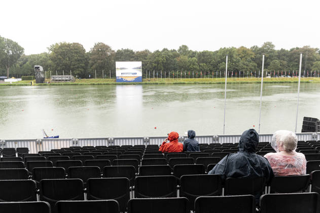 Amsterdam The Netherlands 28th August 2026 2026 World Rowing Championships on the Bosbaan in Amsterdam Rain stops play. Bad weather doesn™t exist if you have the correct clothing. A few brave souls wait in the rain on the tribune for the racing to recommence.