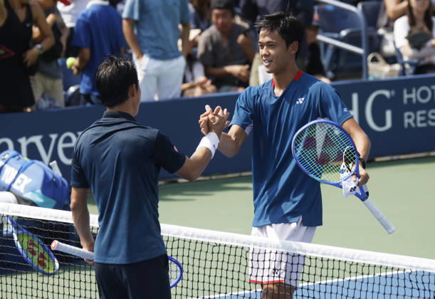 Kei Nishikori of Japan meets Rei Sakamoto of Japan at net after his straight sets defeat in a qualifying final round match at the 2026 US Open Tennis Championship at the USTA Billie Jean King National Tennis Center in New York City on Friday, August 28, 2026. This was Nishikori s final Grand Slam appearance.  NYP20260828136 JOHNxANGELILLO
