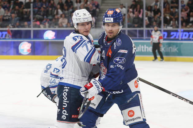 August 29, 2026, Zurich, SWITZERLAND, Swiss Life Arena, 2026–2027 Ice Hockey Season, Exhibition Game: ZSC Lions vs. Adler Mannheim, Zach Solow (Adler) vs. Mikko Lehtonen (ZSC Lions)
