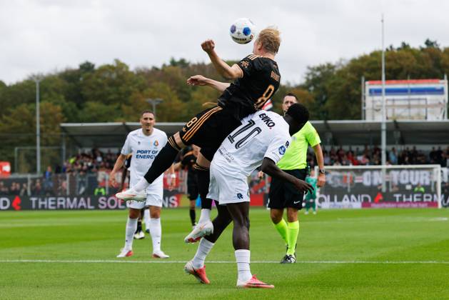 VELSEN-ZUID , 30-08-2026 , BUKO Stadion , season 2026 2027 , Dutch Eredivisie football , match between Telstar and Ajax , Picture shows Ajax player Julian Brandt, Telstar player Tyrone Owusu Telstar - Ajax  x206249006x Copyright: