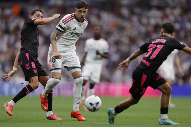 Federico Valverde of Real Madrid CF and Carlos Dotor of Málaga CF battle for the ball during the LaLiga EA Sports match between Real Madrid CF and Málaga CF at Estadio Santiago Bernabéu on August 30, 2026, in Madrid, Spain. Photo by Manu Reino, DeFodi Images