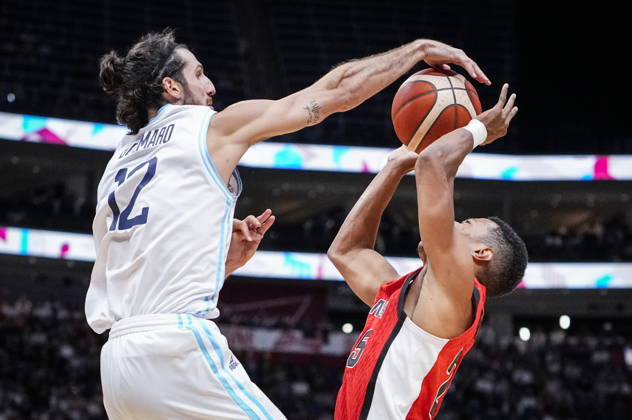 August 31, 2026, Quebec City, Pq, Canada: Argentina s Leandro Bolmaro (12) blocks Canada s Trae Bell-Haynes (25) during their FIBA world cup qualification action in Quebec City, Monday, Aug.Ã‚ 31, 2026. Trae Bell-Haynes (25) Leandro Bolmaro (12)  - ZUMAc35_ 20260831_zaf_c35_090 Copyright: xMathieuxBelangerx