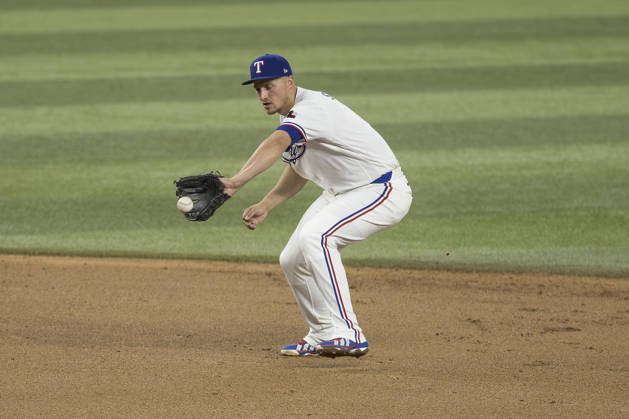 August 31, 2026, Arlington, Texas, USA: Texas Rangers shortstop COREY SEAGER (5) fields a ground ball against the Athletics at Globe Life Field. Rangers win 8-1. Arlington USA - ZUMAf180 20260831_zsp_f180_002 Copyright: xMarkxFannx