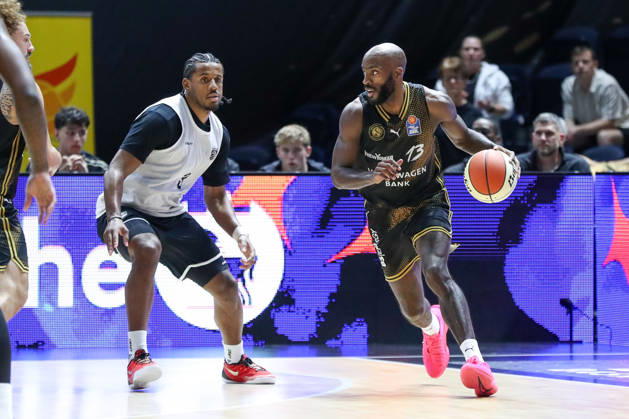 September 4, 2026, xgox, Basketball Exhibition Game: Basketball, Löwen Braunschweig vs. Bamberg Baskets, emspor, from left: Sheldon Edwards (Braunschweig), No. 13 with the ball, plays the ball (Braunschweig)