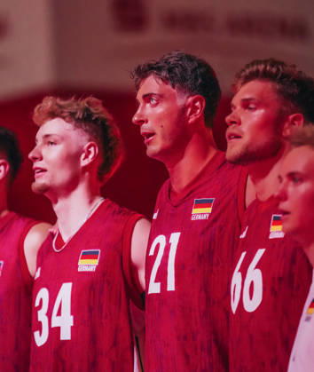 GER, Volleyball, European Championship Dress Rehearsal, Friendly Match, Germany vs. Netherlands, 09 26 04 National Anthem in Focus Tobias Krick, 21, Germany Photo: HMB Media Etienne Schlick Copyright: HMBxMedia EtiennexSchlick