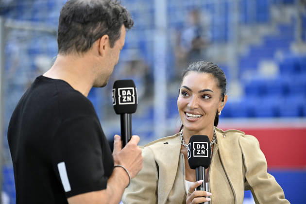 TV expert Michael Ballack DAZN profile interview microphone DAZN logo DAZN reporter and host Valentina Maceri TSG 1899 Hoffenheim vs. Borussia Dortmund BVB September 5, 2026 DFL regulations prohibit any use of photographs as image sequencesENCES AND OR QUASI-VIDEO TSG 1899 Hoffenheim vs. Borussia Dortmund (BVB)
