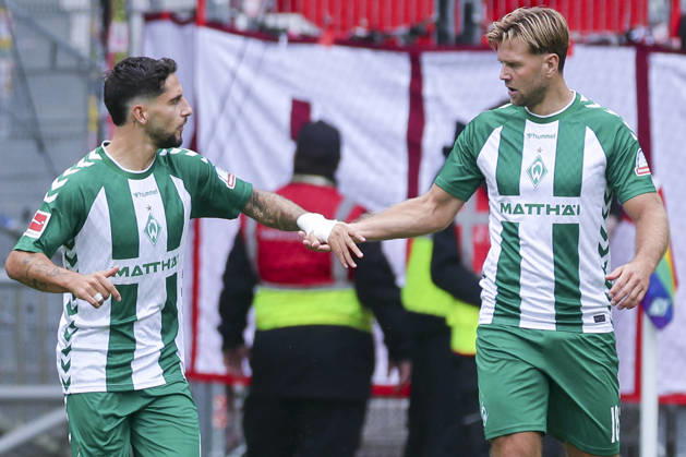 Eren Dinkci of Werder Bremen celebrates his goal to make it 1–0 with Niclas Füllkrug of Werder Bremen during the Bundesliga 1 match between SV Werder Bremen and RB Leipzig at Weserstadion on September 5, 2026, in Bremen, Germany. Photo by Marco Steinbrenner, DeFodi Images. Eren Dinkci of Werder Bremen celebrates after scoring his team’s first goal with Niclas Füllkrug of Werder Bremen during the Bundesliga match between SV Werder Bremen and RB Leipzig at Weserstadion on September 5, 2026 in Bremen, Germany. Photo by Marco Steinbrenner, DeFodi Images. DFB and DFL regulations prohibit any use of photographs as image sequences and or quasi-video. Photo by Marco Steinbrenner, DeFodi Images.