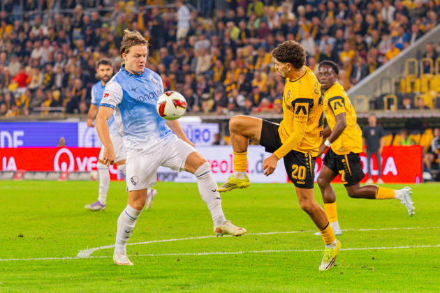 Germany 2. Bundesliga, 2026–2027 Season, September 5, 2026, Matchday 4, SG Dynamo Dresden vs. VfL Bochum, Rudolf Harbig Stadium; Christian Rasmussen (VfL Bochum) in a tackle against Ben Justus Bobzien (SG Dynamo Dresden), 20 Copyright: xMichellexLukax
